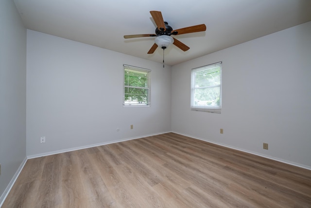 8741 Meadow Ln, Berrien Springs, MI 49103 - unfurnished room featuring light wood-type flooring and ceiling fan