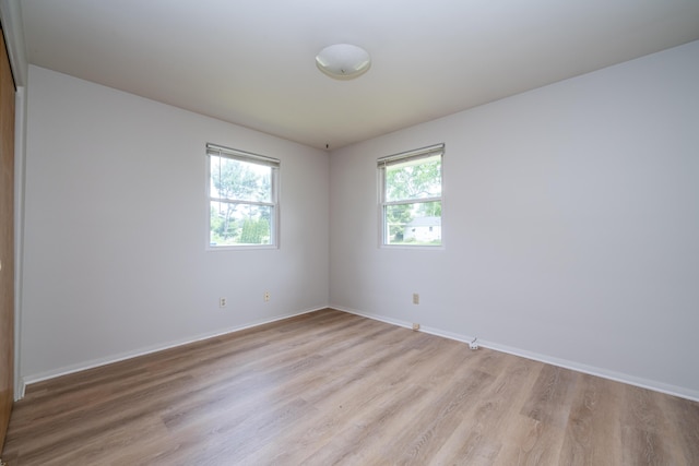 8741 Meadow Ln, Berrien Springs, MI 49103 - unfurnished room featuring light wood finished floors and baseboards