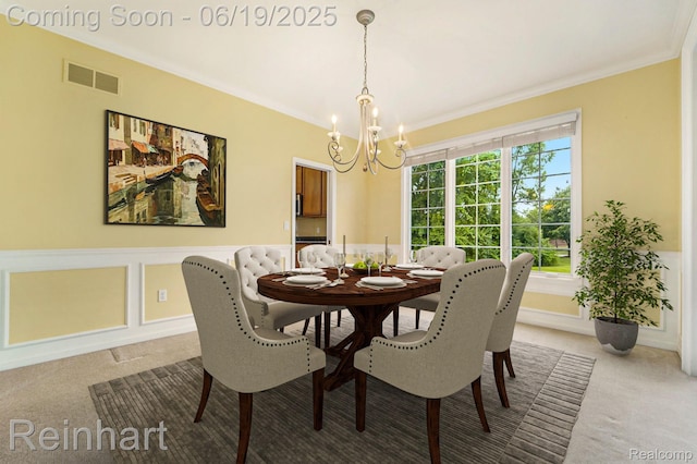 2032 Cameo Ct, Canton, MI 48187 - dining room with light carpet, a chandelier, crown molding, and wainscoting