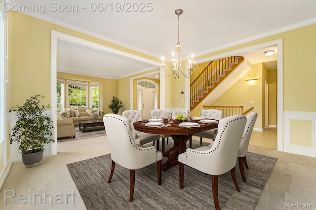 2032 Cameo Ct, Canton, MI 48187 - carpeted dining space featuring stairway, ornamental molding, a chandelier, and wainscoting