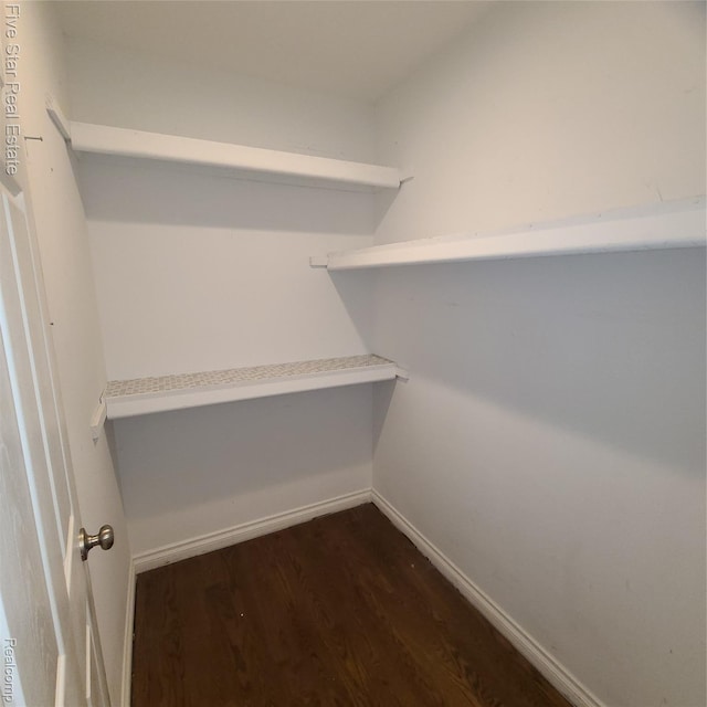 105 Degurse Ave, Marine City, MI 48039 - walk in closet featuring dark wood-style flooring