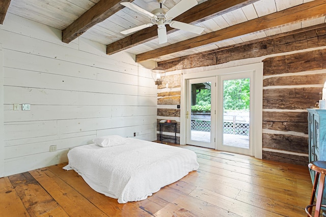 1874 Yeckley Rd, Hastings, MI 49058 - bedroom with wooden walls, access to exterior, a wood ceiling with exposed beams, hardwood / wood-style floors, and ceiling fan