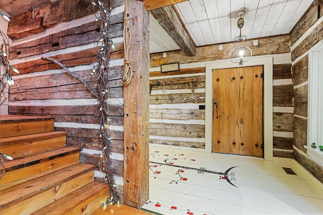 1874 Yeckley Rd, Hastings, MI 49058 - stairs featuring wooden ceiling and wood walls