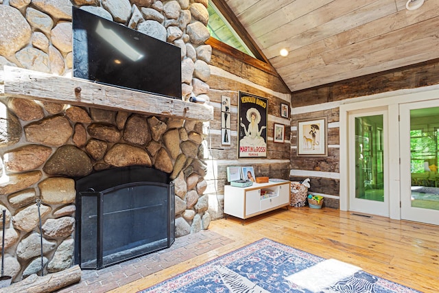 1874 Yeckley Rd, Hastings, MI 49058 - living area featuring wood ceiling, hardwood / wood-style flooring, and a wood stove