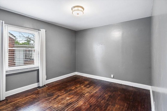 8304 Pinehurst St, Detroit, MI 48204 - unfurnished room featuring wood finished floors and baseboards