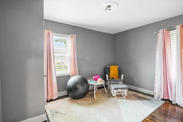 8304 Pinehurst St, Detroit, MI 48204 - sitting room featuring baseboards and wood finished floors
