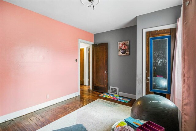 8304 Pinehurst St, Detroit, MI 48204 - rec room with wood finished floors and baseboards