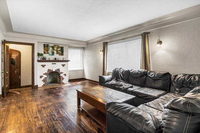 8304 Pinehurst St, Detroit, MI 48204 - living room featuring hardwood / wood-style flooring, a textured wall, and a fireplace
