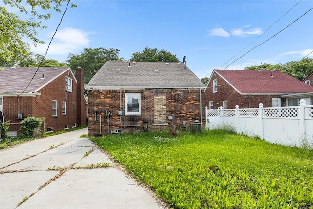 8304 Pinehurst St, Detroit, MI 48204 - rear view of house with brick siding and driveway