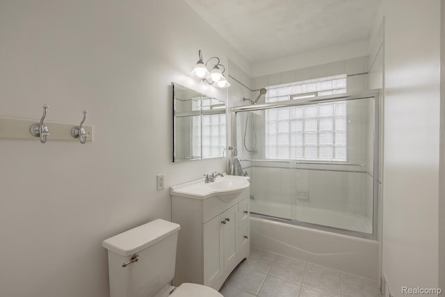 284 W Clarkston Rd, Lake Orion, MI 48362 - full bath featuring vanity, tile patterned floors, and enclosed tub / shower combo