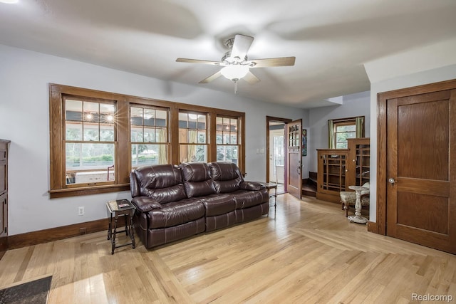 284 W Clarkston Rd, Lake Orion, MI 48362 - living area with ceiling fan and light wood finished floors