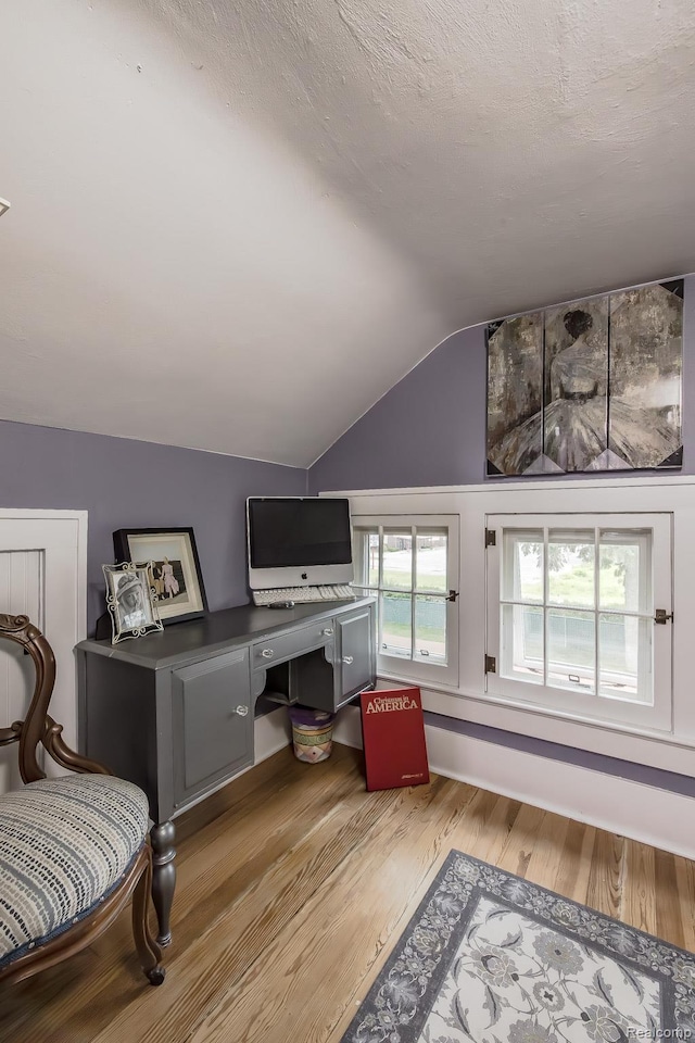 284 W Clarkston Rd, Lake Orion, MI 48362 - office area with vaulted ceiling and wood finished floors