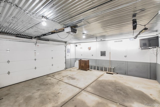 284 W Clarkston Rd, Lake Orion, MI 48362 - garage featuring a garage door opener