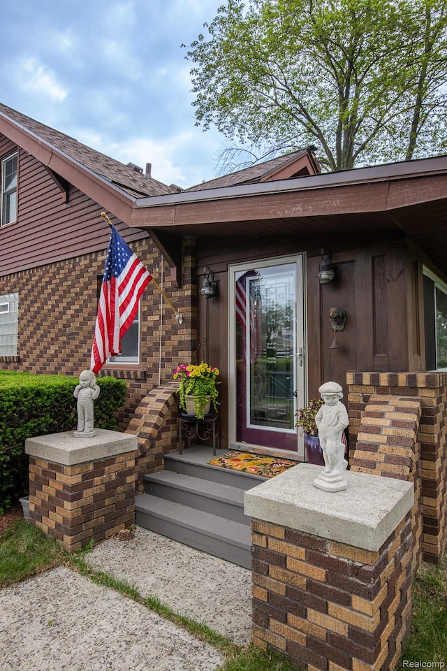 284 W Clarkston Rd, Lake Orion, MI 48362 - property entrance with brick siding
