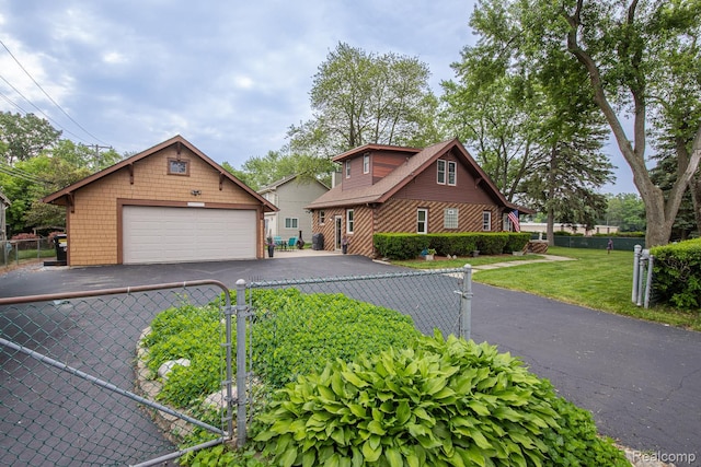 284 W Clarkston Rd, Lake Orion, MI 48362 - view of front of home with a garage and an outbuilding