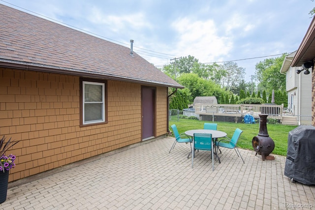 284 W Clarkston Rd, Lake Orion, MI 48362 - view of patio / terrace with outdoor dining area, a grill, and a deck