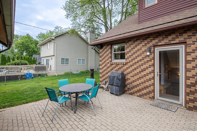 284 W Clarkston Rd, Lake Orion, MI 48362 - view of patio / terrace with a grill and outdoor dining space