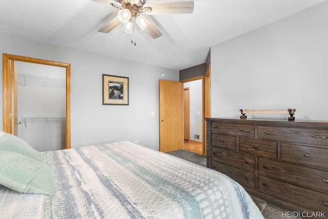 2973 Riley Ridge Rd, Holland, MI 49424 - bedroom featuring carpet, a closet, and a ceiling fan