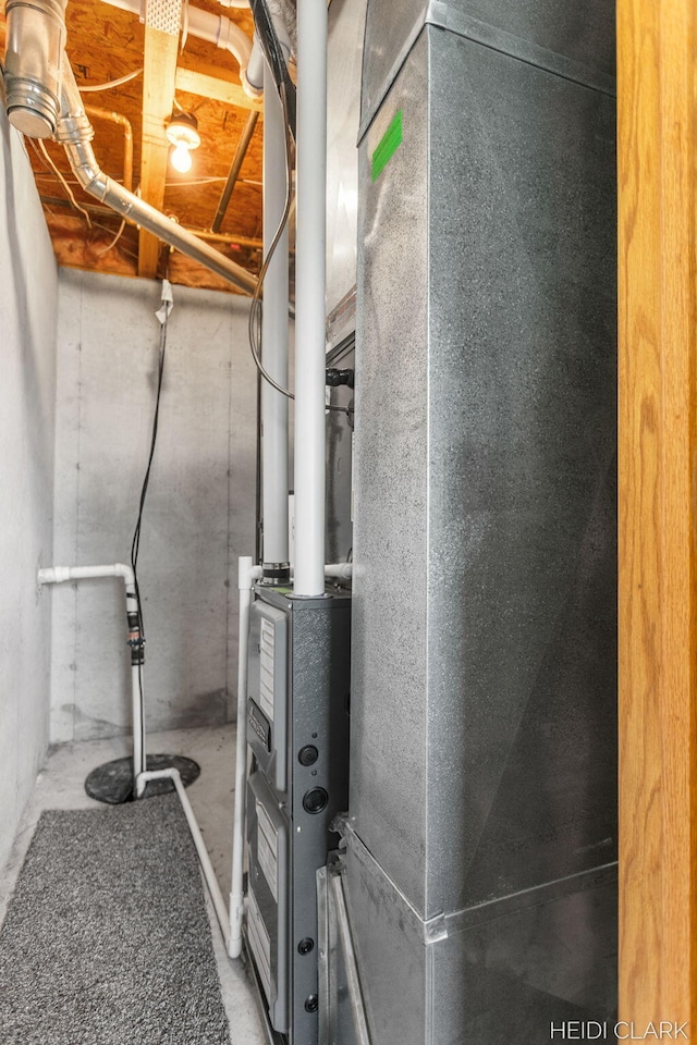 2973 Riley Ridge Rd, Holland, MI 49424 - utility room featuring heating unit