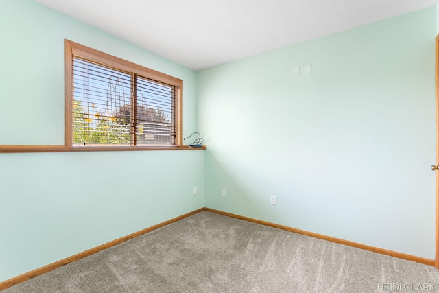 2973 Riley Ridge Rd, Holland, MI 49424 - carpeted empty room with baseboards