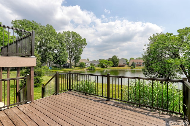 2973 Riley Ridge Rd, Holland, MI 49424 - deck with a water view and a yard