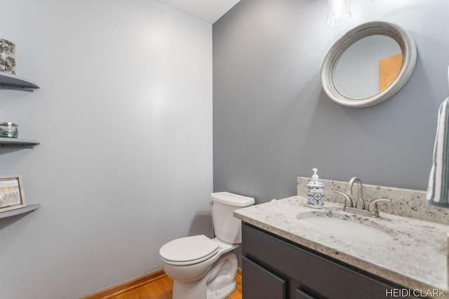 2973 Riley Ridge Rd, Holland, MI 49424 - bathroom with vanity and wood finished floors