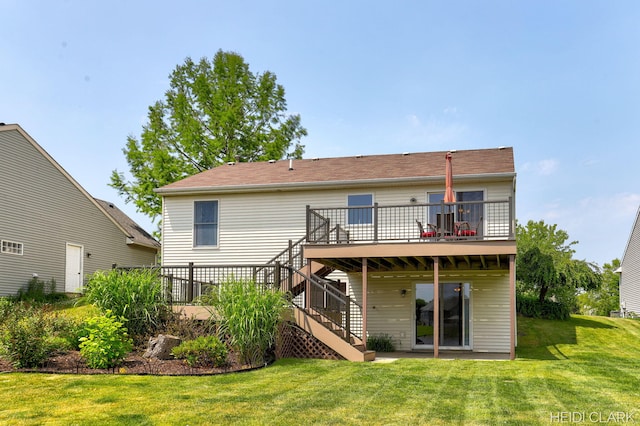 2973 Riley Ridge Rd, Holland, MI 49424 - rear view of property with a deck, stairs, and a yard