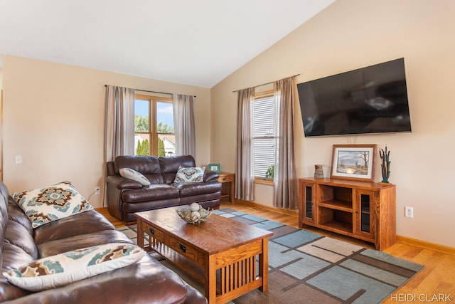 2973 Riley Ridge Rd, Holland, MI 49424 - living room featuring wood finished floors and lofted ceiling