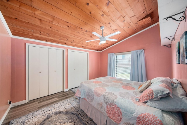 2759 Hemlock Rd, Quincy, MI 49082 - bedroom with vaulted ceiling, wood finished floors, two closets, wood ceiling, and a ceiling fan