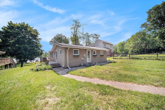 2759 Hemlock Rd, Quincy, MI 49082 - view of front of house with a deck