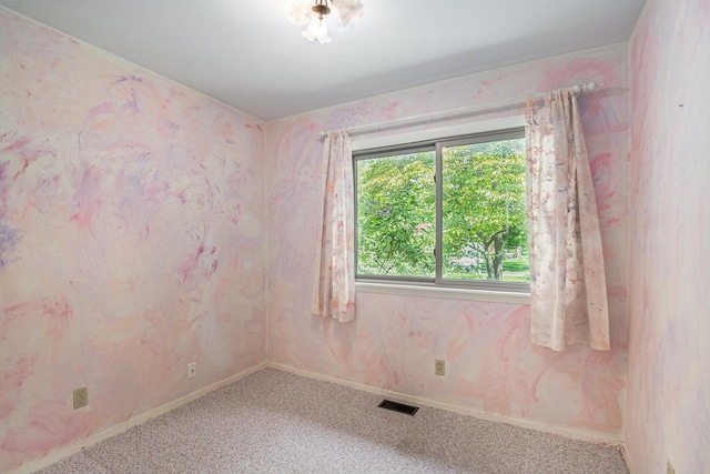 522 Lyon St, South Haven, MI 49090 - carpeted empty room featuring baseboards