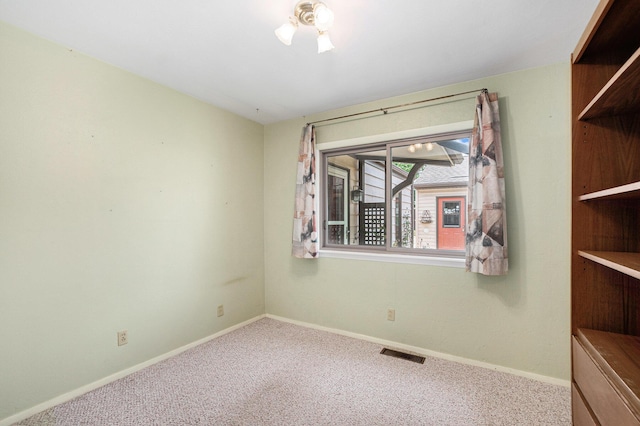 522 Lyon St, South Haven, MI 49090 - carpeted spare room featuring baseboards