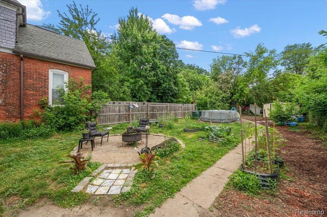 1769 W Warren Ave, Detroit, MI 48208 - view of yard featuring a fire pit