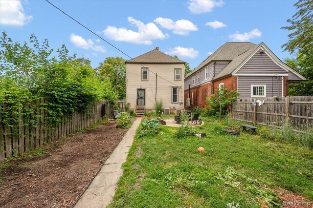 1769 W Warren Ave, Detroit, MI 48208 - back of property featuring a fenced backyard