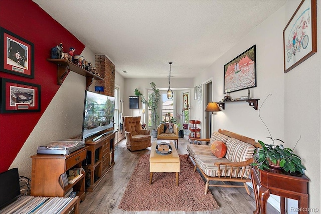 1769 W Warren Ave, Detroit, MI 48208 - living area with wood finished floors