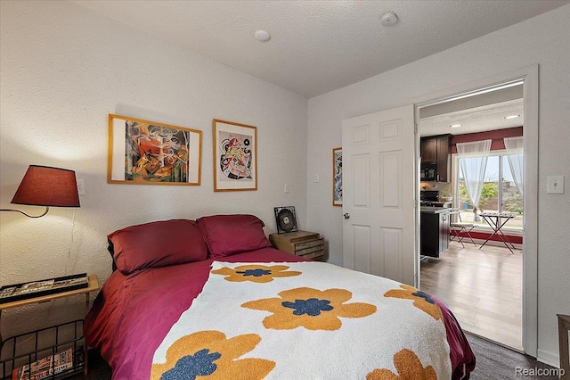 1769 W Warren Ave, Detroit, MI 48208 - bedroom featuring wood finished floors