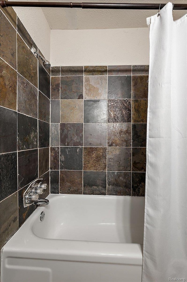 1769 W Warren Ave, Detroit, MI 48208 - bathroom featuring shower / bath combination with curtain