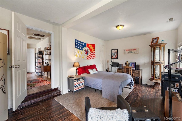 1769 W Warren Ave, Detroit, MI 48208 - bedroom with dark wood-type flooring
