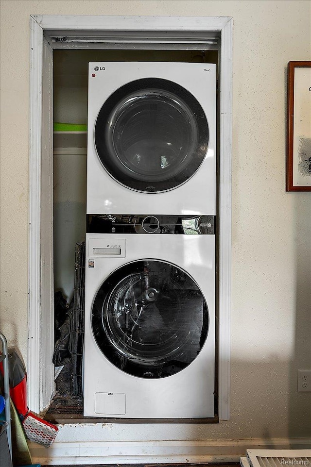 1769 W Warren Ave, Detroit, MI 48208 - laundry room with stacked washer and clothes dryer