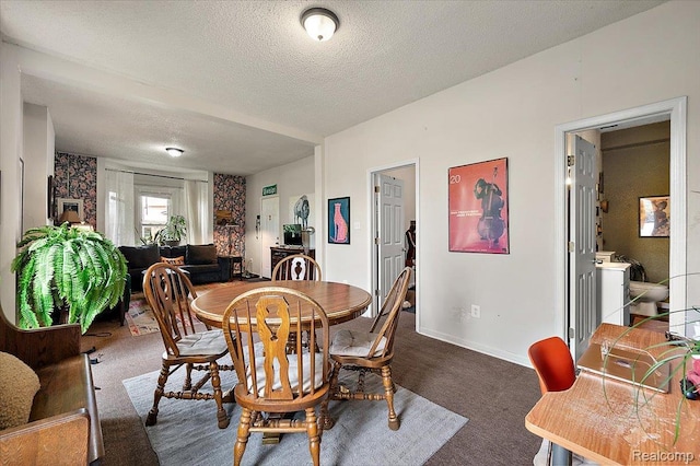 1769 W Warren Ave, Detroit, MI 48208 - carpeted dining space featuring a textured ceiling and baseboards