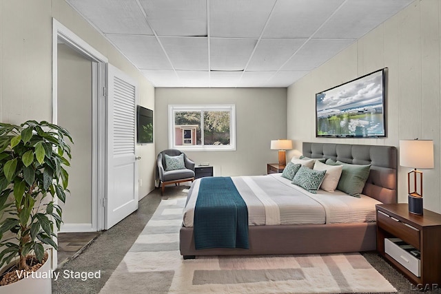 338 Cherry St, Blissfield, MI 49228 - carpeted bedroom featuring a drop ceiling