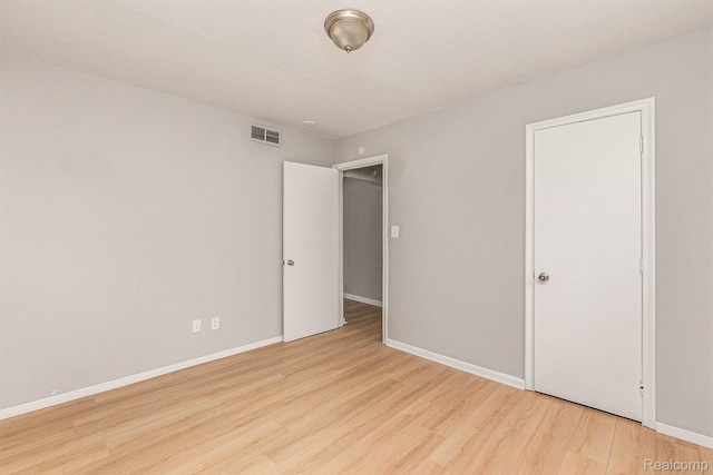 20846 Atlantic Ave, Warren, MI 48091 - unfurnished bedroom with wood finished floors and baseboards