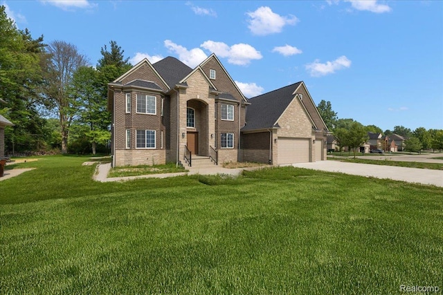 56350 Willow Creek Blvd, Utica, MI 48316 - view of front of property featuring brick siding, driveway, a front lawn, and an attached garage