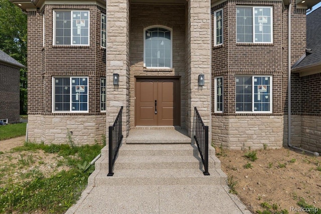 56350 Willow Creek Blvd, Utica, MI 48316 - property entrance featuring stone siding