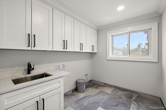 56350 Willow Creek Blvd, Utica, MI 48316 - laundry room featuring cabinet space, crown molding, marble finish flooring, recessed lighting, and washer hookup