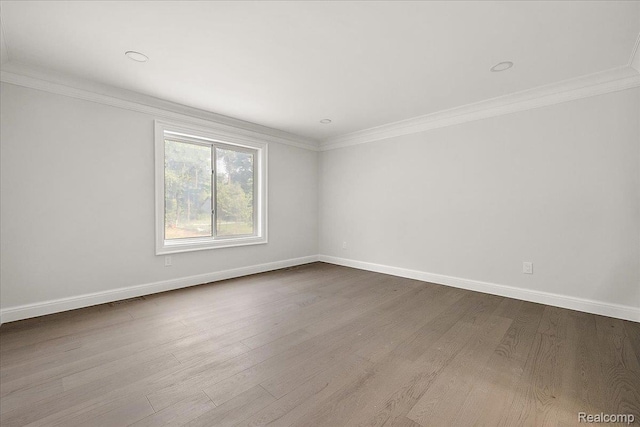 56350 Willow Creek Blvd, Utica, MI 48316 - unfurnished room with ornamental molding and dark wood-style flooring