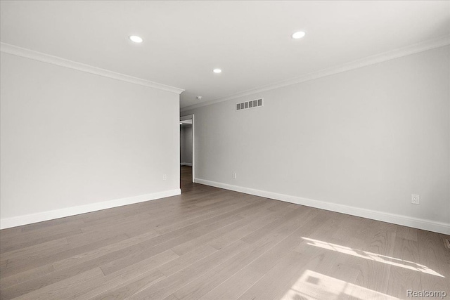 56350 Willow Creek Blvd, Utica, MI 48316 - unfurnished room featuring crown molding, recessed lighting, and wood finished floors