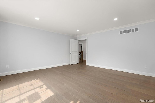 56350 Willow Creek Blvd, Utica, MI 48316 - unfurnished room with recessed lighting, crown molding, and wood finished floors