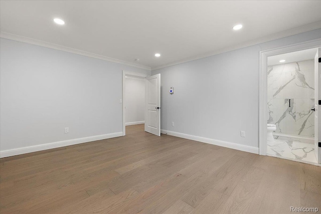 56350 Willow Creek Blvd, Utica, MI 48316 - spare room with recessed lighting, ornamental molding, and wood finished floors