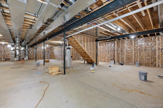 56350 Willow Creek Blvd, Utica, MI 48316 - unfinished below grade area featuring water heater, stairway, and heating unit